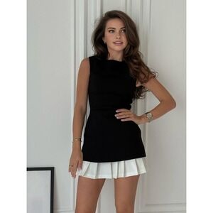 Commense Black Sleeveless Mini Dress with White Pleated Hem
